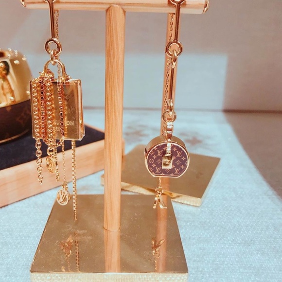 Louis Vuitton Jewelry - Louis Vuitton mismatched earrings